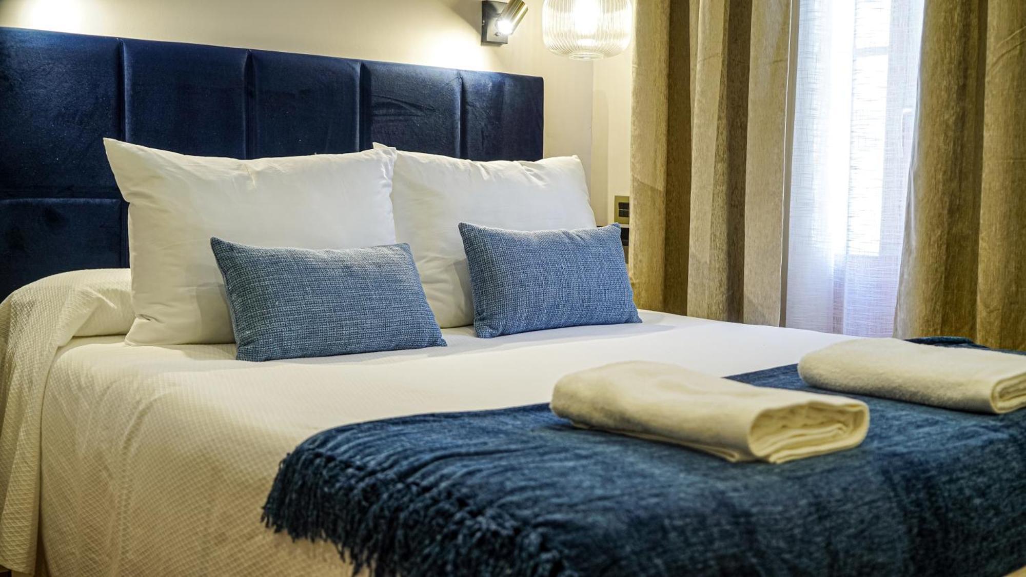Apartamentos Puente Romano Suites Mérida Luaran gambar